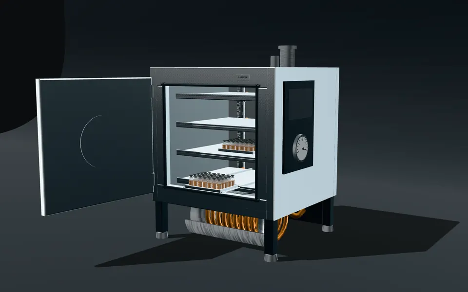 Lyophiliser chamber with four shelves, a loaded tray of vials and the condenser behind its separating valve.
